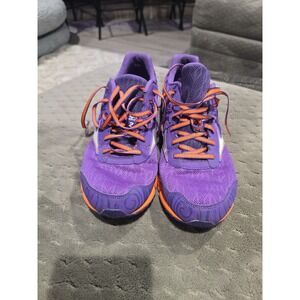 Mizuno Wave Hitogami 2 running shoes in a purple and orange colorway womens 10.5
